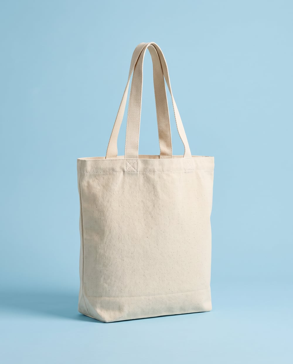 Natural cotton tote, flat webbing handles, one screen printed mark