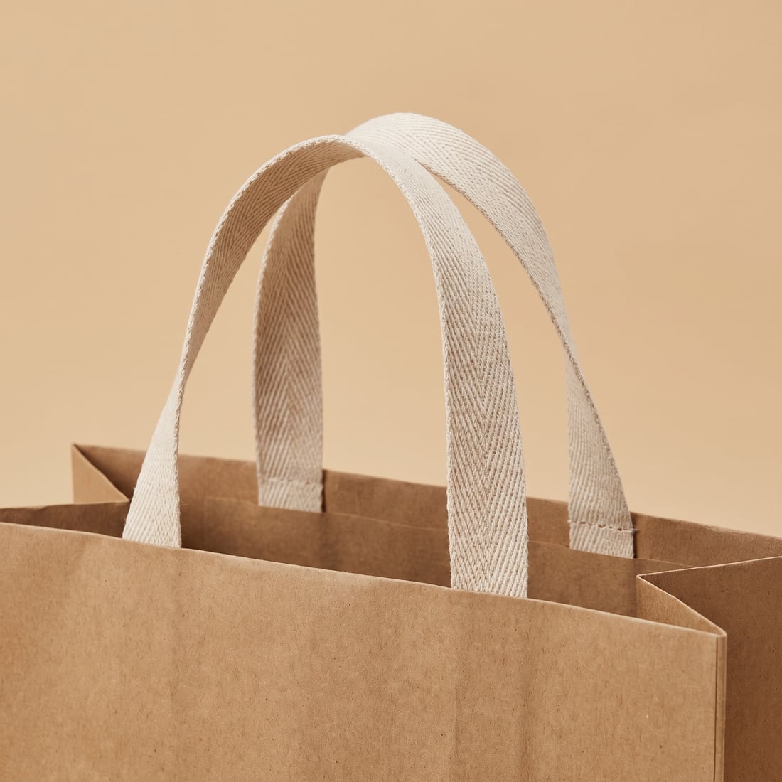 Herringbone tape on a kraft paper bag, close up