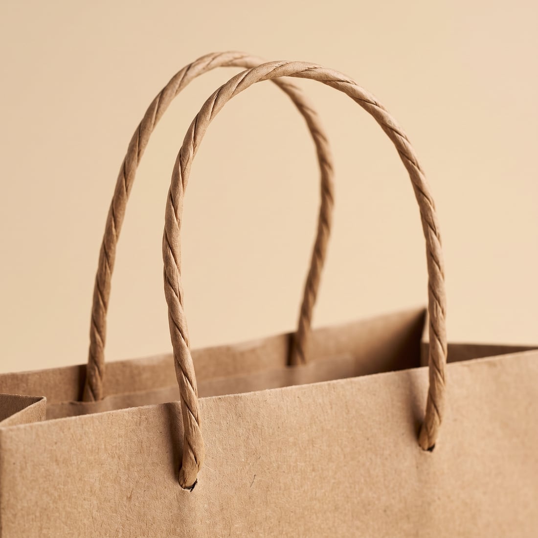 Twisted paper on a kraft paper bag, close up